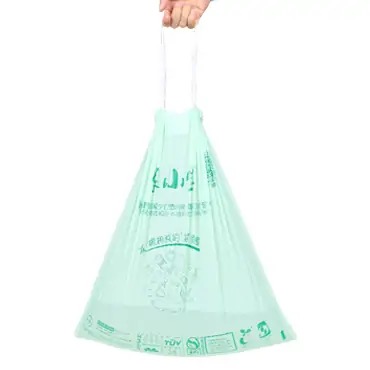 Biodegradable drawstring bag made from cornstarch, with eco label and reusable string