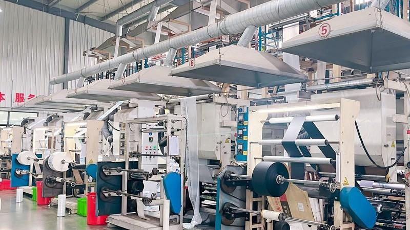Heat sealing and cutting compostable bags on a bag making machine