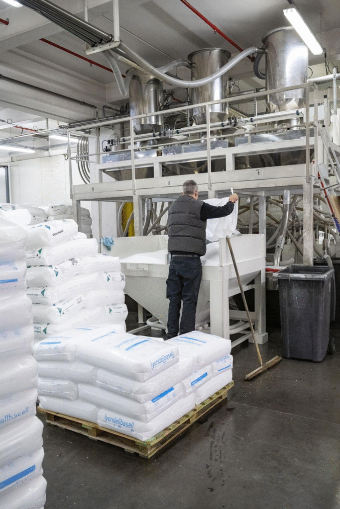 Mixing PLA and PBAT resins with fillers during the compostable bag manufacturing process