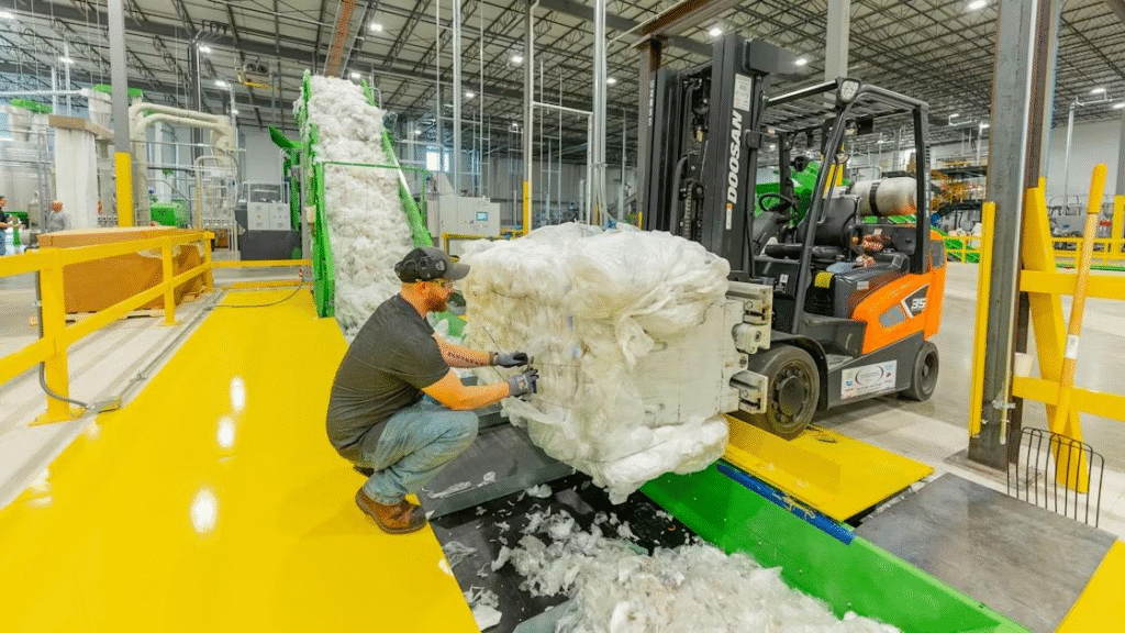 Are Plastic Bags Recyclable? What Actually Happens to Them (2026 Guide) 1 Plastic film recycling facility processing baled polyethylene bags and flexible plastic materials